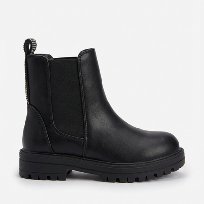 Botte Chelsea noire pour enfant, élastique latéral et semelle robuste antidérapante.